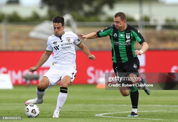 Besart Berisha of Western United challenges Benat Etxebarria of Macarthur FC during the A-League match between Western United and Macarthur FC at...