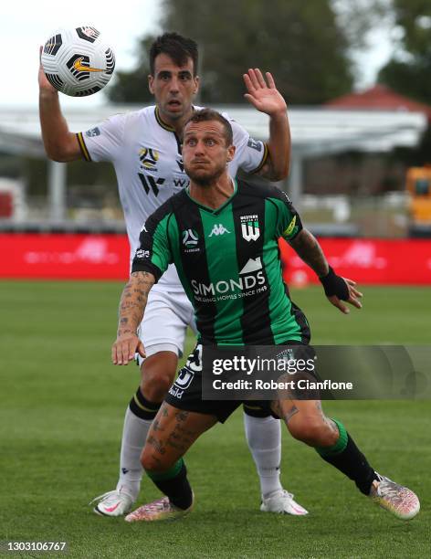 Alessandro Diamanti of Western United is challenged by Benat Etxebarria of Macarthur FC during the A-League match between Western United and...