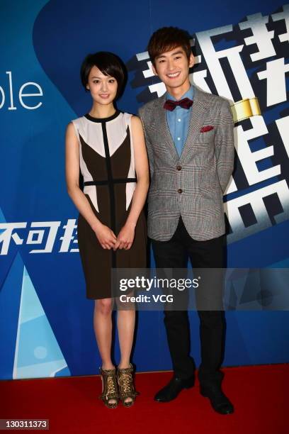 Actor Zhang Han and actress Zheng Shuang attend the Grand Ceremony Of Movie And TV New Forces at new studio of Enlight Media on Ocotber 25, 2011 in...