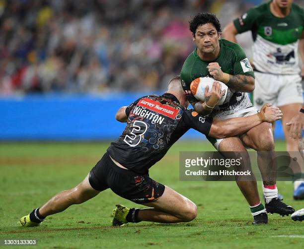 Issac Luke of the Maori All Stars is tackled by Jack Wighton of the Indigenous All Stars during the NRL All Stars game between the Indigenous and the...