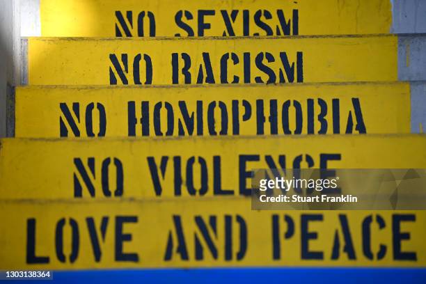 Words to highlight diversity and inclusion are seen on a staircase inside the stadium prior to the Second Bundesliga match between VfL Osnabrück and...