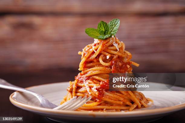 spaghetti bolognese - tomato sauce stock pictures, royalty-free photos & images