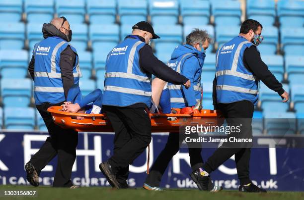 Callum Slattery of Gillingham FC is stretched off injured during the Sky Bet League One match between Gillingham and Bristol Rovers at MEMS...