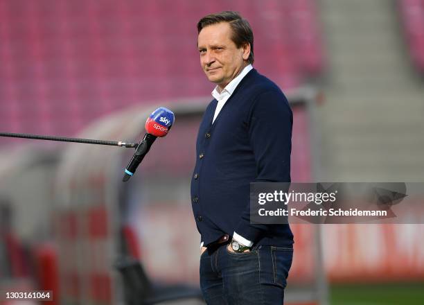 Horst Heldt, 1. FC Koeln Managing Director of Sport talks to Sky Sports prior to the Bundesliga match between 1. FC Koeln and VfB Stuttgart at...