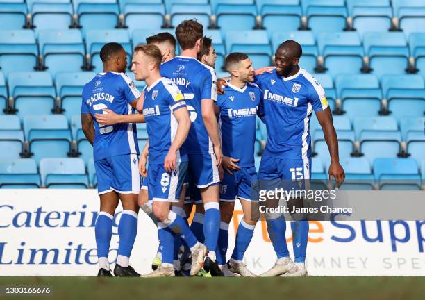 John Akinde of Gillingham FC celebrates with Stuart O'Keefe after scoring his sides second goal during the Sky Bet League One match between...