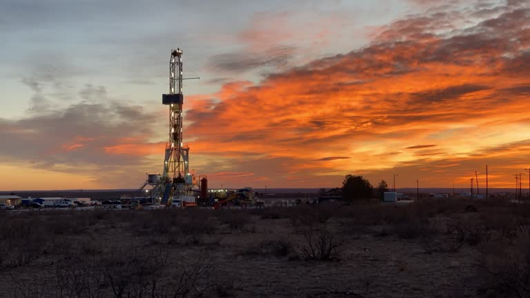 https://media.gettyimages.com/id/1303177844/video/drone-view-of-an-oil-or-gas-drill-fracking-rig-pad-with-beautiful-cloud-filled-sky-at-sunrise.jpg?b=1&s=640x640&k=20&c=iGL2ZYOG3TjEiC-xBhwDKHK9RjZcqS2Y2tE4-CaHrZs=