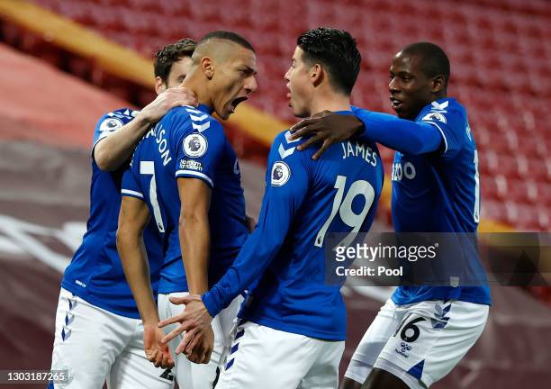 Richarlison of Everton celebrates with teammates Seamus Coleman, James Rodriguez and Abdoulaye Doucoure after scoring his team's first goal during...