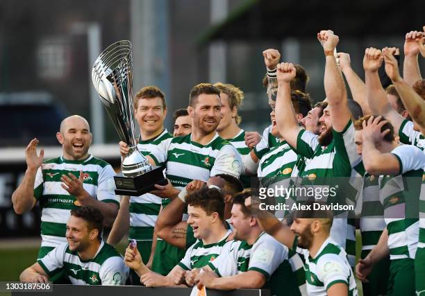 Rayn Smid of Ealing Trailfinders lifts the Trailfinders Challenge Cup with his teammates after victory in the Trailfinders Challenge Cup match...
