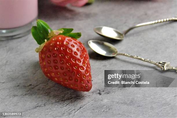 strawberry and silver teaspoons - elegant spoon stock pictures, royalty-free photos & images