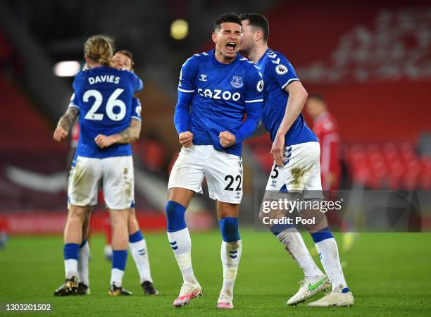 Ben Godfrey and Michael Keane of Everton celebrate following their team's victory in the Premier League match between Liverpool and Everton at...
