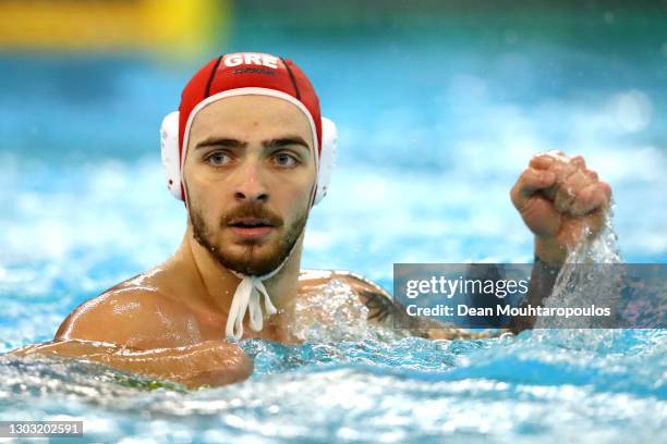 Goalkeeper, Emmanouil Zerdevas of Greece celebrates making a save during Day 7 of the FINA Men's Water Polo Olympic Games Qualification Tournament...