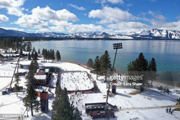 In an aerial view from a drone, the Vegas Golden Knights and the Colorado Avalanche warm-up prior to the NHL Outdoors at Lake Tahoe at the Edgewood...