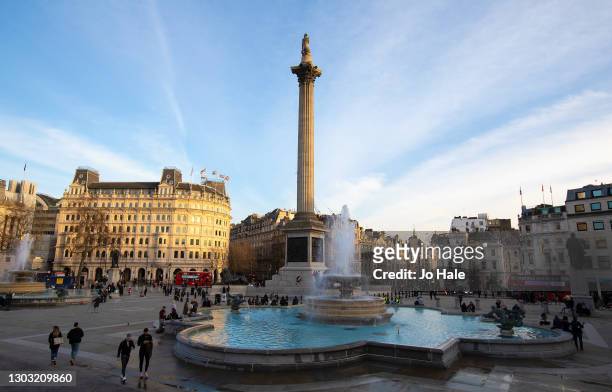 Busier Bustling Trafalgar Square on February 20, 2021 in London, England. After a surge of covid-19 cases, fueled partly by a more infectious variant...