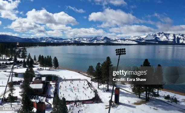 In an aerial view from a drone, the Vegas Golden Knights and the Colorado Avalanche warm-up prior to the NHL Outdoors at Lake Tahoe at the Edgewood...