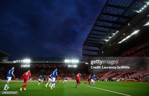 Tom Davies of Everton battles for possession with Curtis Jones of Liverpool during the Premier League match between Liverpool and Everton at Anfield...