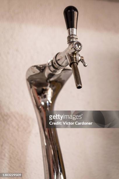 craft beer on tap - beer pump stock pictures, royalty-free photos & images