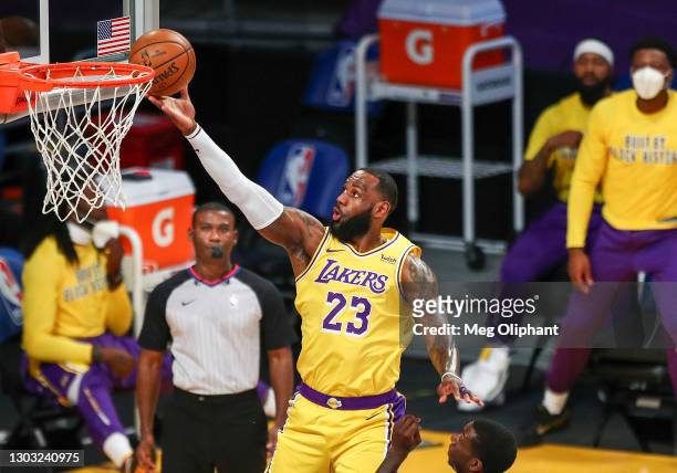 LeBron James of the Los Angeles Lakers shoots a layup in the first quarter against the Miami Heat at Staples Center on February 20, 2021 in Los...