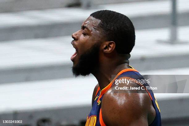 Eric Paschall of the Golden State Warriors reacts following a play during the second quarter of their game against the Charlotte Hornets at Spectrum...