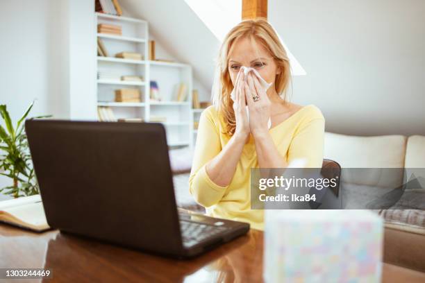 business woman has problems due to seasonal allergies - spring allergies stock pictures, royalty-free photos & images