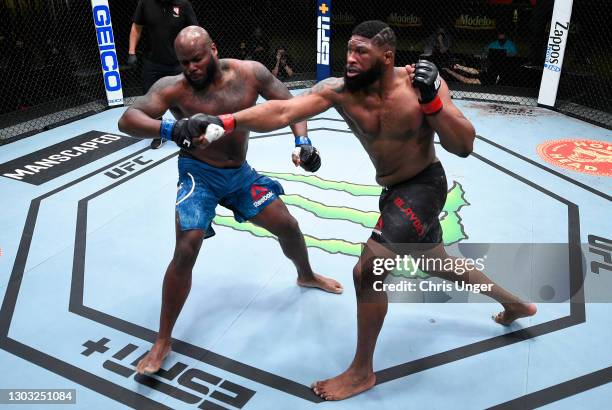 Curtis Blaydes punches Derrick Lewis in a heavyweight bout during the UFC Fight Night event at UFC APEX on February 20, 2021 in Las Vegas, Nevada.