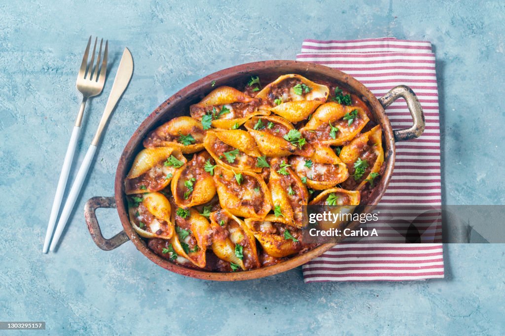 Baked shell pasta with bolognese sauce