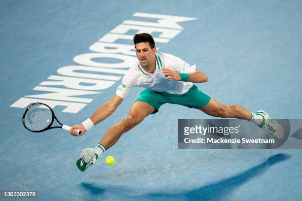 Novak Djokovic of Serbia plays a forehand in his Men’s Singles Final match against Daniil Medvedev of Russia during day 14 of the 2021 Australian...