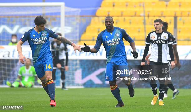 Stefano Okaka of Udinese Calcio celebrates with team mate Kevin Bonifazi after scoring their side's first goal during the Serie A match between Parma...