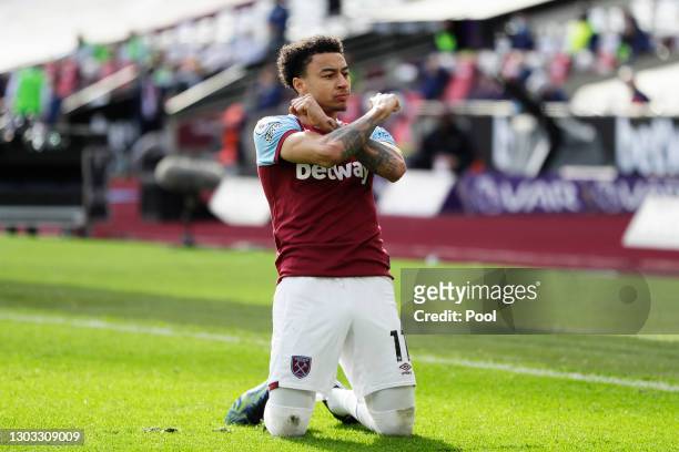 Jesse Lingard of West Ham United celebrates after scoring their side's second goal during the Premier League match between West Ham United and...