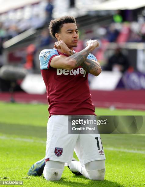 Jesse Lingard of West Ham United celebrates after scoring their side's second goal during the Premier League match between West Ham United and...