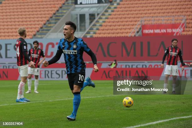 Lautaro Martinez of Internazionale celebrates after heading the ball past Gianluigi Donnarumma of AC Milan to give the side a 1-0 lead during the...