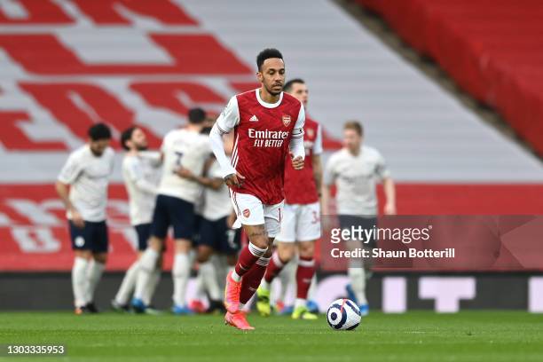 Pierre Emerick Aubameyang of Arsenal looks dejected after conceding his sides first goal during the Premier League match between Arsenal and...