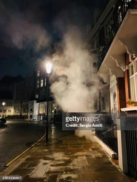 steam from lower ground floor pool - vertical chelsea london stock pictures, royalty-free photos & images
