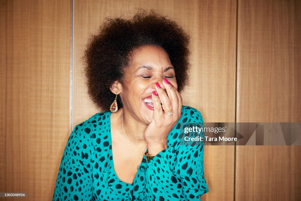 Mature woman laughing