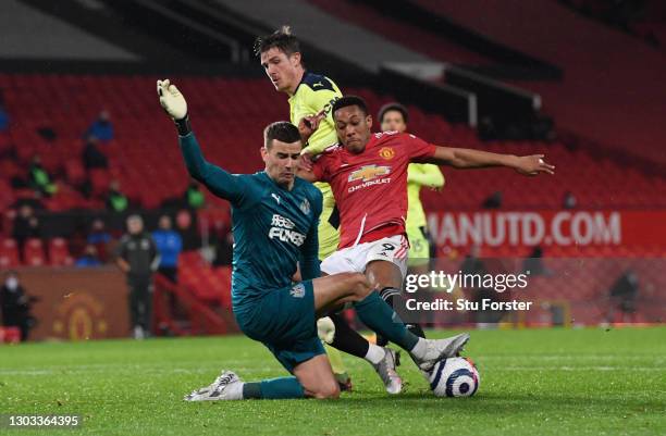 Anthony Martial of Manchester United has a shot saved by Karl Darlow of Newcastle United during the Premier League match between Manchester United...