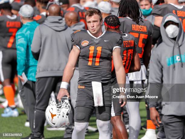 Quarterback Sam Ehlinger from Texas of the National Team on the sidelines during the 2021 Resse's Senior Bowl at Hancock Whitney Stadium on the...