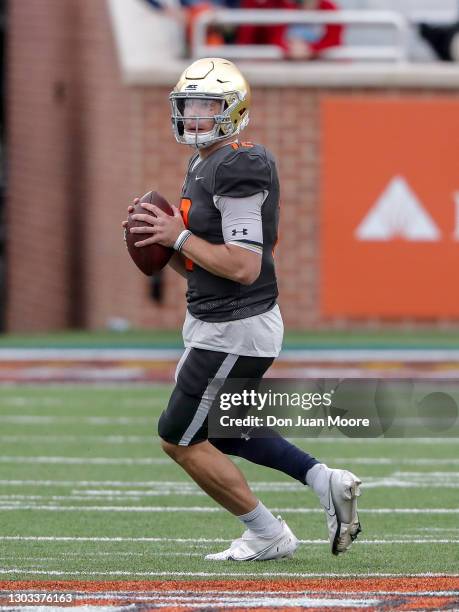 Quarterback Ian Book from Notre Dame of the National Team on a pass play during the 2021 Resse's Senior Bowl at Hancock Whitney Stadium on the campus...