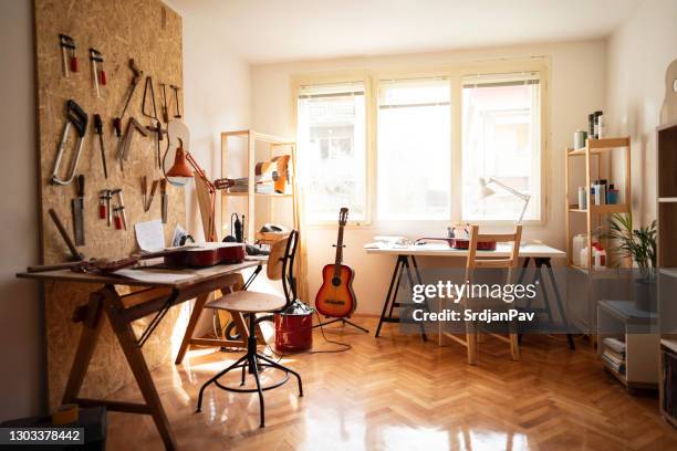 bright craft guitar studio - guitar shop stock pictures, royalty-free photos & images