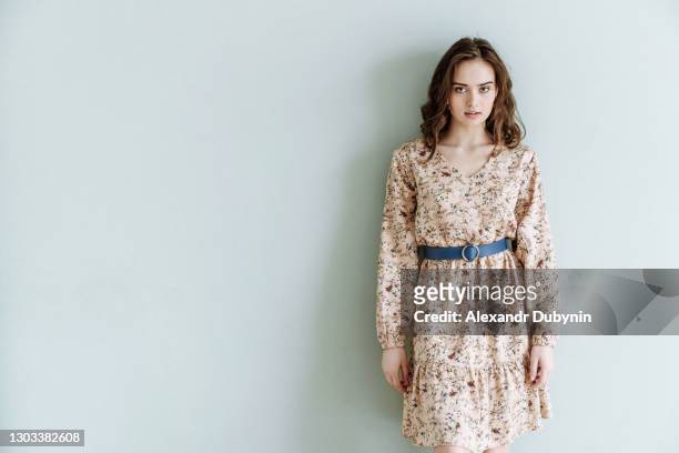 young woman model in dress looking at the camera - woman waist up isolated stock pictures, royalty-free photos & images