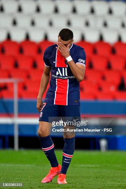 Kylian Mbappe of Paris Saint-Germain reacts during the Ligue 1 soccer match between Paris Saint-Germain and AS Monaco at Parc des Princes on February...