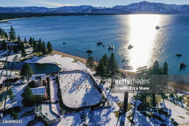 In an aerial view from a drone, the Boston Bruins and the Philadelphia Flyers warm-up prior to the 'NHL Outdoors At Lake Tahoe' at the Edgewood Tahoe...