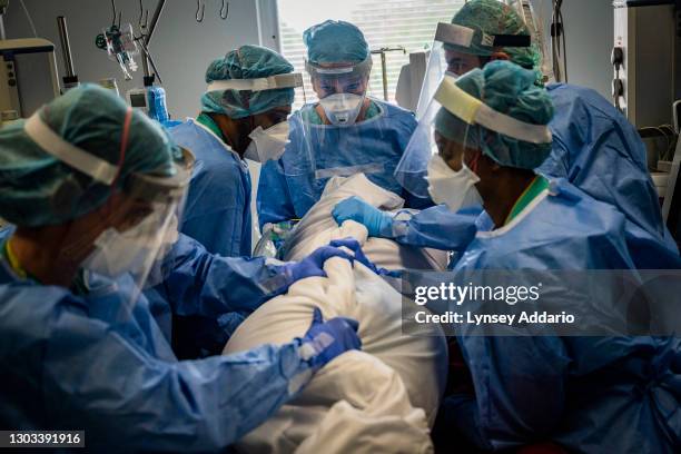 Anaesthesiologist Caroline Borkett-Jones leads a team in turning a COVID-19 patient at the Royal Free Hospital on June 8, 2020 in London, United...