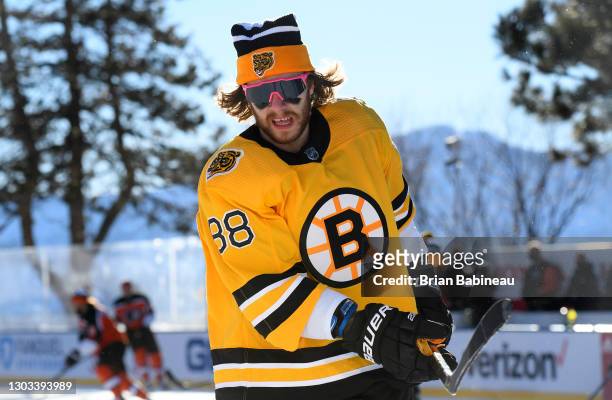 David Pastrnak of the Boston Bruins attends warm ups before playing against the Philadelphia Flyers in the 2021 NHL Outdoors Sunday presented by...