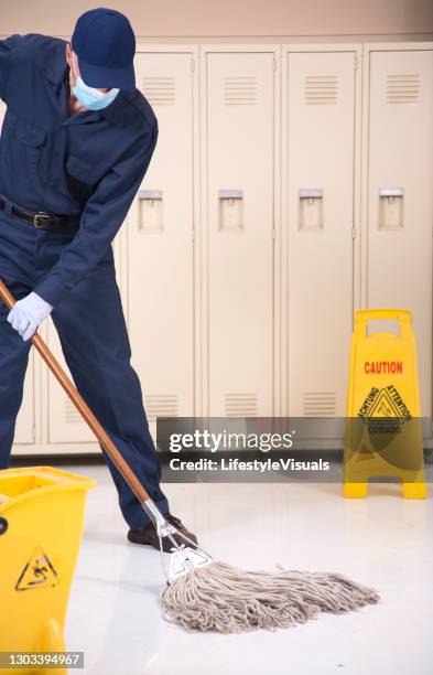 Janitor Mask 52 Janitor Cleaning Lobby Stock Photos, High-Res Pictures, and Images ...