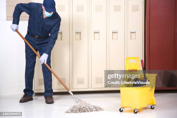 Janitor Mask Janitor Cleaning Lobby Photos and Premium High Res Pictures - Getty Images