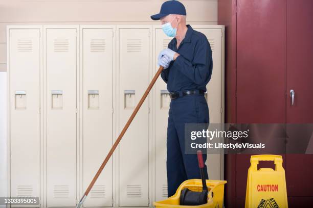 Janitor Mask Janitor Cleaning Lobby Photos and Premium High Res Pictures - Getty Images