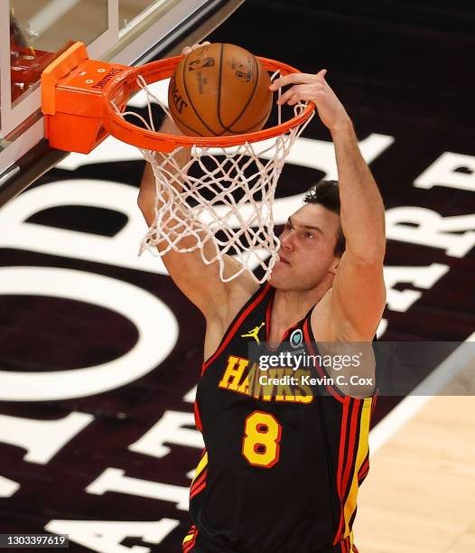 Danilo Gallinari of the Atlanta Hawks dunks against the Denver Nuggets during the first half at State Farm Arena on February 21, 2021 in Atlanta,...