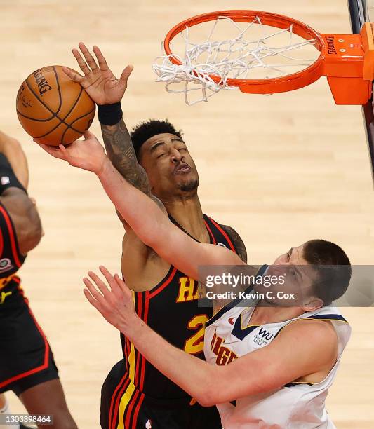 Hawk Blocks John Block (Basketball) Photos and Premium High Res Pictures - Getty Images