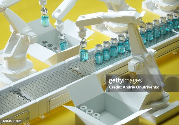 covid-19 vaccine production line. - pharma manufacturing stock pictures, royalty-free photos & images