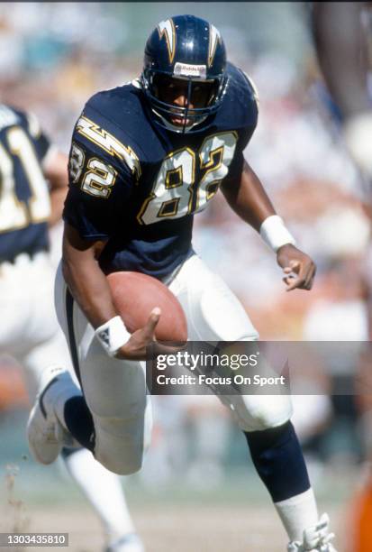 Rod Bernstine of the San Diego Chargers carries the ball against the Cincinnati Bengals during an NFL football game on September 16, 1990 at Jack...