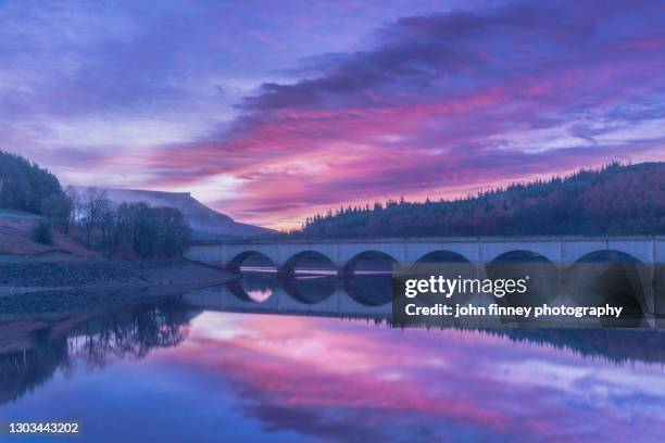 ladybower reservoir sunrise. peak district. uk - dambusters stock pictures, royalty-free photos & images